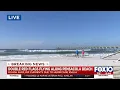 Double red flags flying along Pensacola Beach due to Idalia