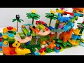 Marbles Race Through a GIANT Dinosaur Jungle LEGO DUPLO Marble Run