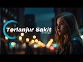 Download Lagu Terlanjur Sakit ( Lirik lagu )