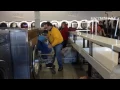 Mark Henderson talks about the crew washing blankets for the Warming Center at Tiny Bubbles laundrom