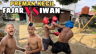 the boxing match between little thug pajar and iwan was very exciting 