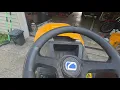 Driving Cub Cadet Riding Mower 8-14-2026