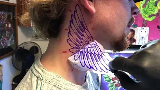 Wing Neck Tattoo