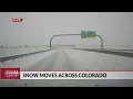 Snow-packed roads create dangerous conditions along I-70