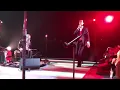 Flea with Nick Cave and Warren Ellis performing “We Know who U R” at the Shrine Auditorium in LA