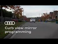 Curb view mirror programming