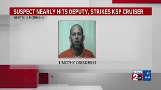 Suspect nearly hits deputy strikes KSP cruiser