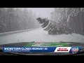 Snowstorm closes Highway 50 tree comes crashing down