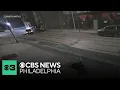 shows car slamming into North Philadelphia apartment building