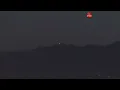 Saucer shaped UFO overtaking a jet in Lincoln