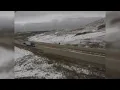 Snow slows traffic on I-90 near state line