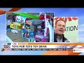 Ken Morrissette Jr being interviewed by WJLA Channel 7 - Toys for Tots