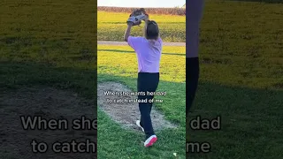 Softball pitching practice with her dad