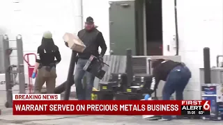 Authorities serving warrant at Omaha precious metals business