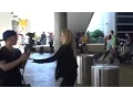 Sheryl Berkoff Pushes An Aggressive Photographer Out Of The Way