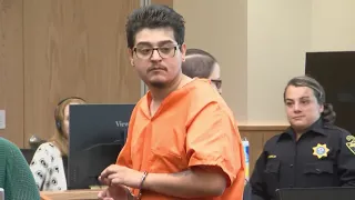 Man accused of killing two Albuquerque auto parts store employees held behind bars