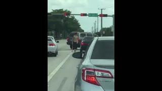 Man uses baseball bat to smash window in road-rage incident
