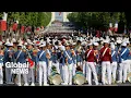 Download Lagu Bastille Day: Paris celebrates with record-breaking parade, Eiffel Tower fireworks display