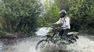 Chris heading across the creek on his KLR 650