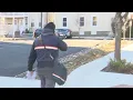 Postal worker finds shoeless boy wandering alone