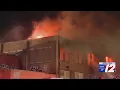 Officials recommend tearing down former Fall River school after massive fire