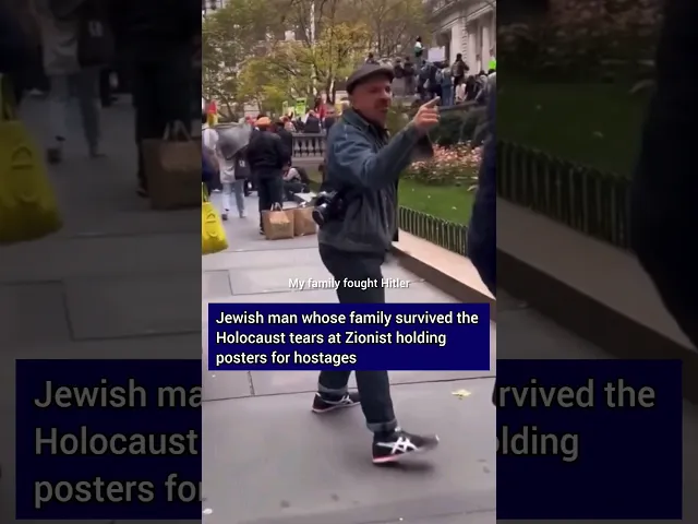 ⁣Jewish man whose family survived holocaust tears at a zionist holding posters for Israeli hostages
