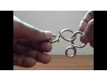 Solution to 8 shaped Metal Ring puzzle