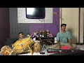 Lagu practicing playing the Jaipong drum with my father