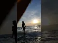 Reading the rock tumbler guide over the sound of waves