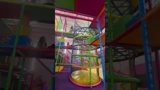 Woman Tumbles Down Net Inside Indoor Playground