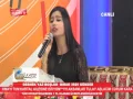 Sevil Özen_Kapının Önünde Önlük Dikiyor