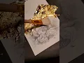 Lagu 23kt gold leaf being added to a drawing. Watch to see it framed. #skulldrawing #gilding #goldleaf