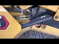CAT 259D3 Hydraulic Fluid Drain if Overfilled