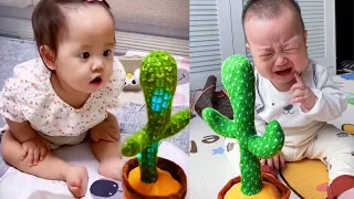 Download Babies play dancing cactus toy. Cutest baby funniest moments. MP3