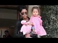 Halle Berry Smacks Photographer While Holding Daughter Nahla 2010