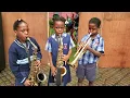 Lagu “Lagos Pride in Brass – Eko Oni Baje Rara O by Mutland School Kids”