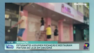 Jovens assumem pichação e recuperam pintura de loja