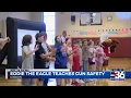 Eddie the Eagle teaches kids about gun safety