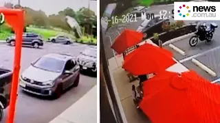 Miracle as a vehicle goes airborne into Wendy s restaurant in the US