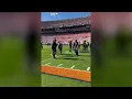 shows sweet moment Coach Saban hugs Miss Terry at the Iron Bowl