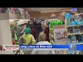 Customers Wait In Line At Door Of Supply Room At Sherman Oaks Rite-Aid