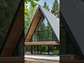 Download Lagu Modern A Frame House Set Against A Backdrop Of Towering Trees #framehouse #tinyhouse #cabinhouse