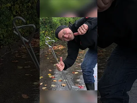 S#078-1 Unclogging a storm drain on a parking space after rain in Germany, #shorts