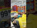 A desk a Pumpkin Skelton and ME Filming inside shopping at BiMart WOW Next Candy Aisle