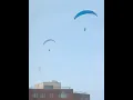 Parasailers on Cleveland shoreline