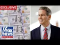 REVEALED Bessent gives first look at Trump-signed 100 dollar bills