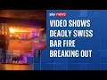 Lagu Video toont hoe het plafond van een bar in een skiresort in brand vliegt, waarbij tientallen jong...