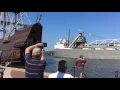 The Mississagi freighter motors past Spanish tall ship in Bay City