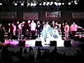 Karen Clark Sheard and Kim Burrell harmonize runs with a young Sangboy singing background.
