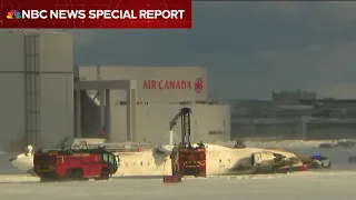 SPECIAL REPORT: Delta plane upside down at Toronto airport after landing incident